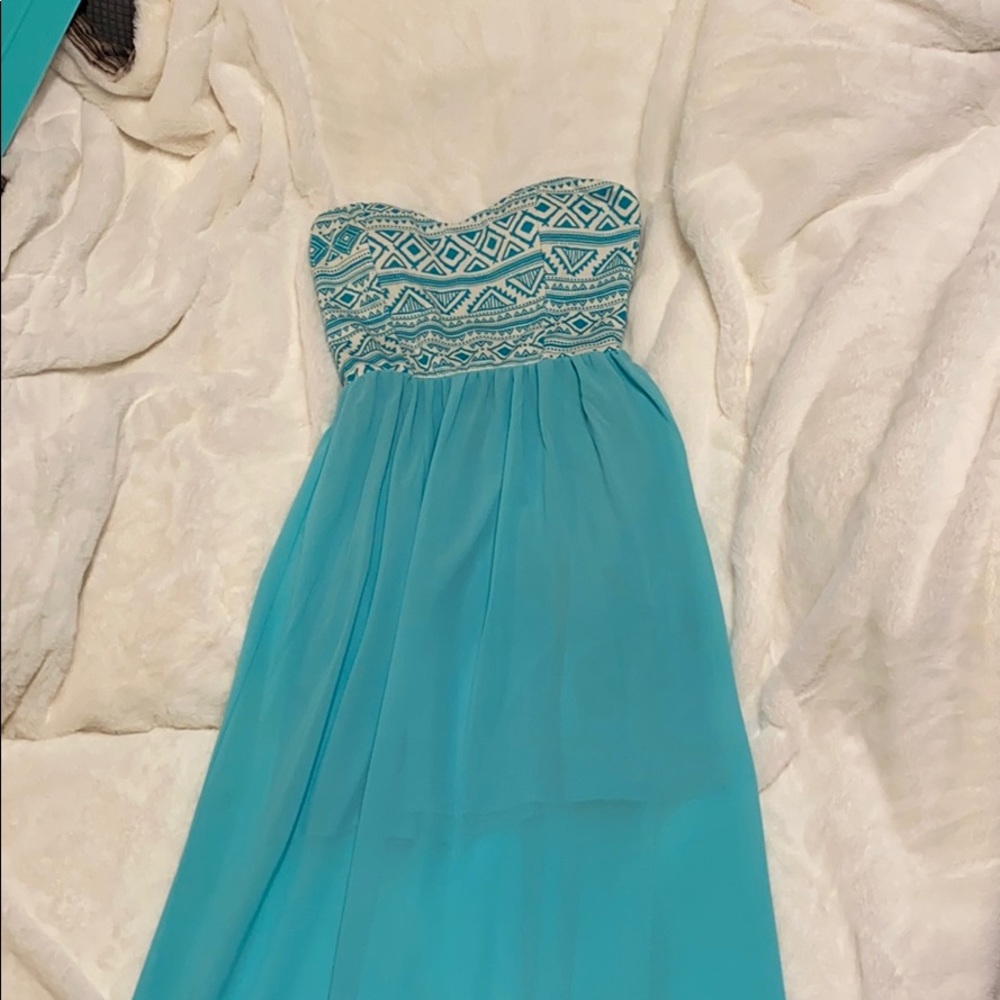 Women’s turquoise maxi dress.